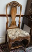 An 18th century Dutch ash chair with vase shaped splat,