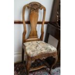 An 18th century Dutch ash chair with vase shaped splat,