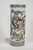 A Chinese porcelain stick stand, decorated in the famille rose palette with scholars,