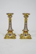 A pair of Royal Crown Derby solid gold band Imari candlesticks,