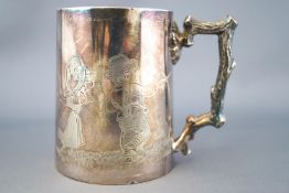 A silver mug, of tapered round form,