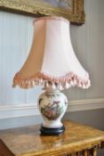 A 20th century porcelain table lamp, decorated in Chinese style,