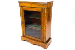 A Victorian walnut pier cabinet with inlaid detail and gilt metal mounts,