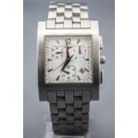 A stainless steel square cased wristwatch, by Longines.