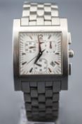 A stainless steel square cased wristwatch, by Longines.