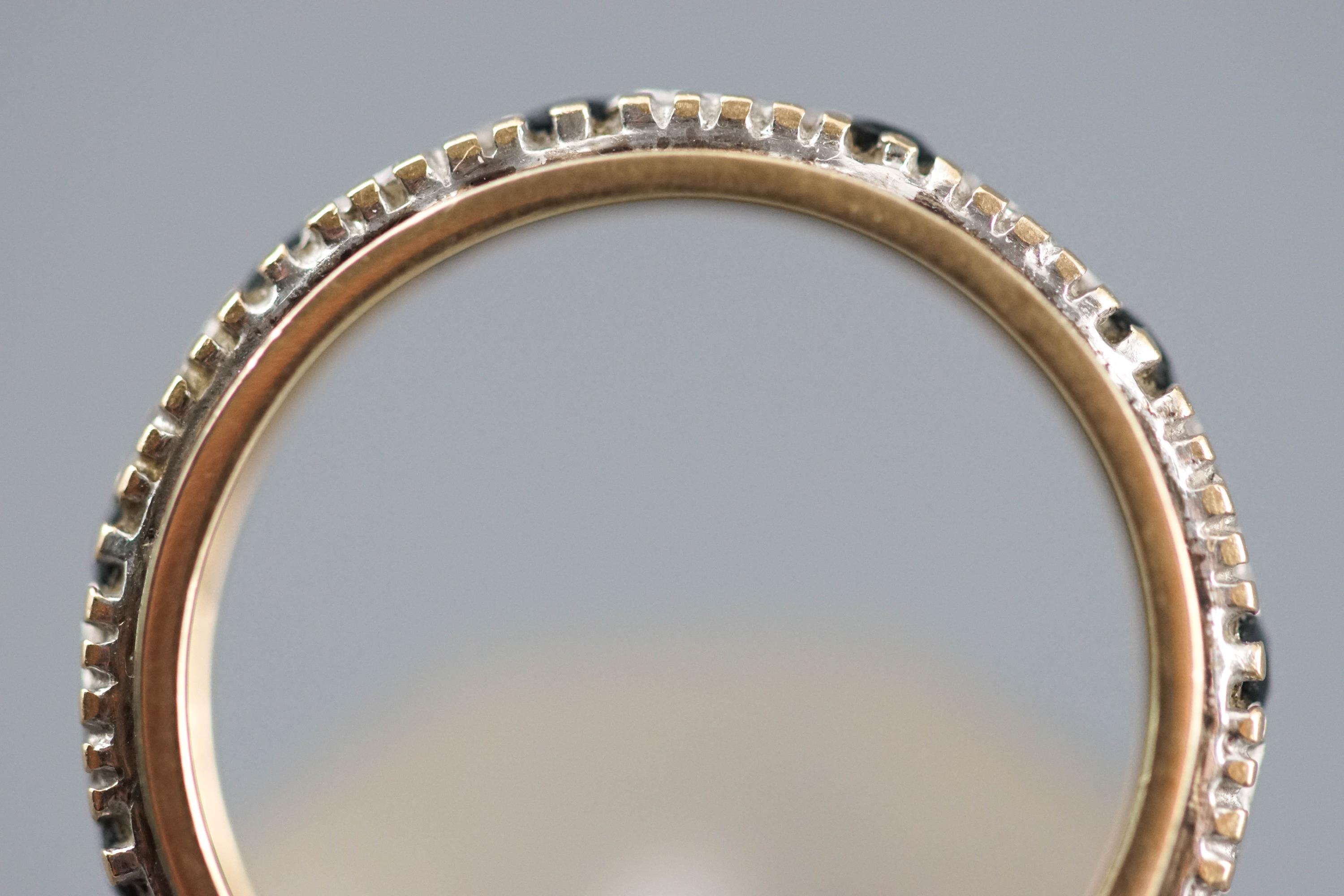 A collection of jewellery to include: A sapphire and diamond full eternity ring, size: M, - Image 3 of 3