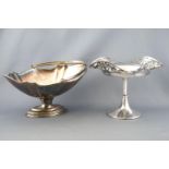 A silver plated swing handled cake basket with fancy applied edge,