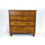 A 19th century mahogany and walnut chest of drawers,