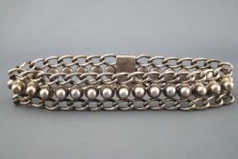 A 19th century white metal chain link dog collar. Push in clasp with fitted safety chain.