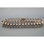 A 19th century white metal chain link dog collar. Push in clasp with fitted safety chain.