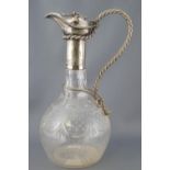 A silver plate mounted claret jug and a silver plated teapot,