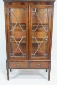 An Edwardian mahogany display cabinet,