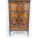 An Edwardian mahogany display cabinet,