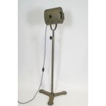 A Furse spotlight on adjustable stand, now converted as a standard lamp,