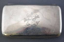 A silver cigar case, of plain rounded rectangular form, Chester 1896, 13cm high,