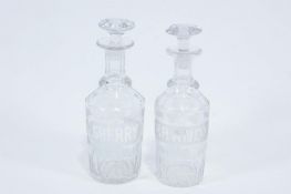 A pair of 19th century cut glass decanters and stoppers,