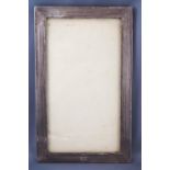 An Art Deco style silver rectangular photograph frame with engine turned decoration,