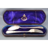 A child's cased silver bead edge pattern dessert spoon and fork, with stipple engraved highlights,