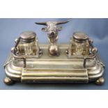 A 19th century electroplated standish of rounded rectangular form,
