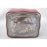 A leather covered shaped small jewel box with an applied silver lid,