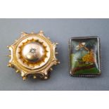 A collection of two brooches to include a base metal mourning brooch set with a rose cut diamond