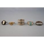 A collection of ten silver rings of variable designs. Size range from I to Q.