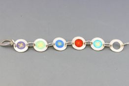 A white metal link bracelet,