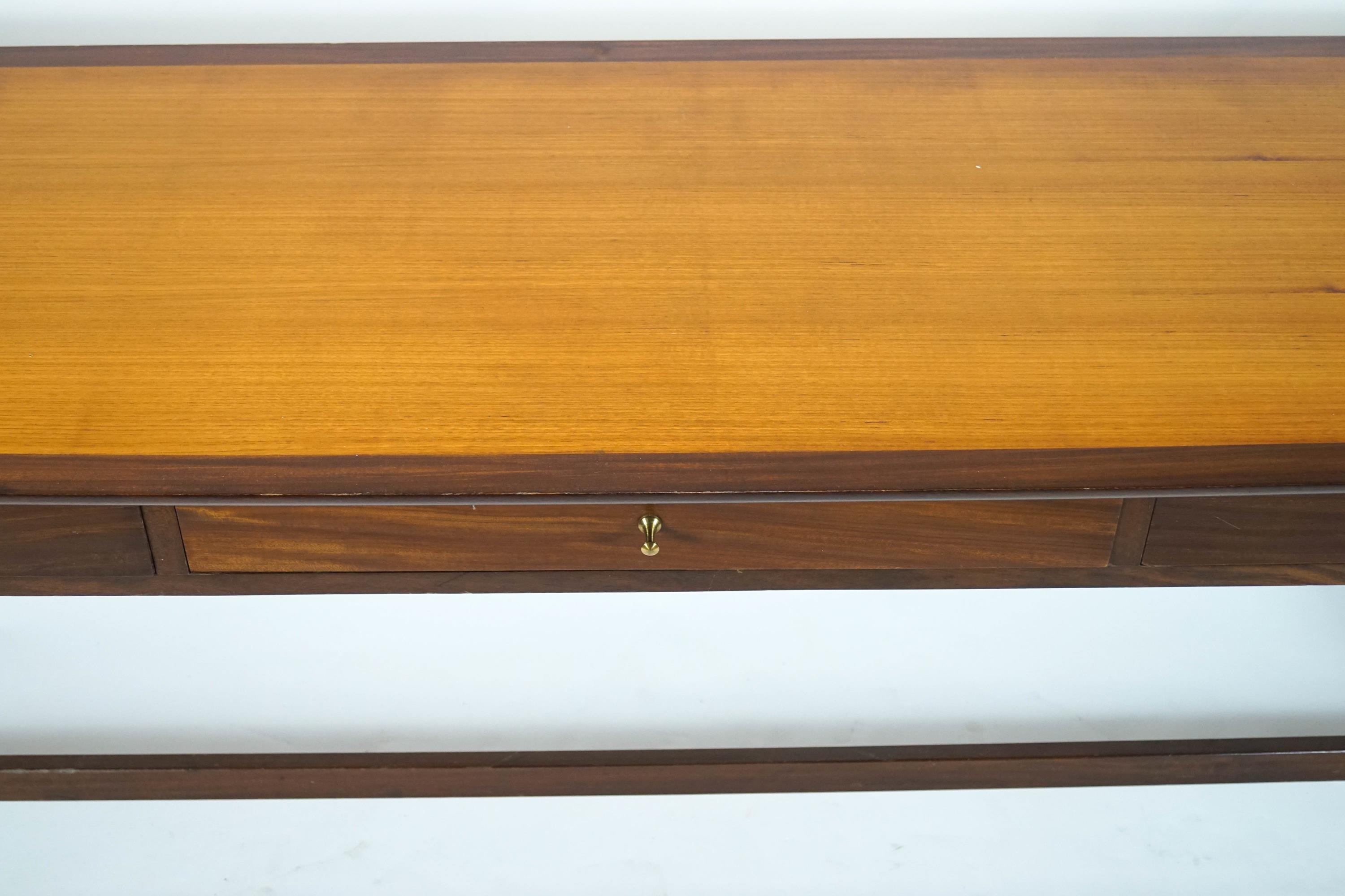 A 1970's Danish style teak and mahogany cross-banded sideboard, with three frieze drawers, - Image 2 of 2