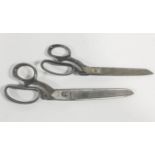 Two pairs of seamstress scissors, the largest by William Rogers Sheffield,