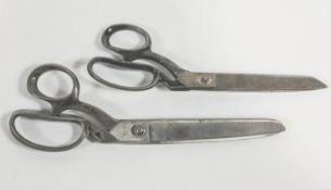 Two pairs of seamstress scissors, the largest by William Rogers Sheffield,