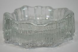 A Finnish Art glass dish, in the form of a rocky landscape with an undulating striated surround,