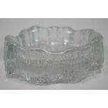 A Finnish Art glass dish, in the form of a rocky landscape with an undulating striated surround,