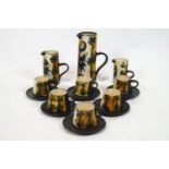 A Celtic pottery coffee set, comprising a coffee jug, milk jug,