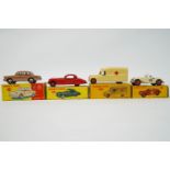 A group of four boxed Dinky toys, to include the 157 Jaguar XK120 coupe, 108 MG Midget Sports,