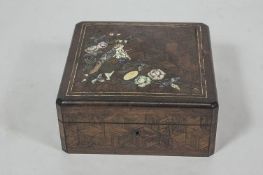 A French parquetry jewellery box, the lid inlaid with bone,