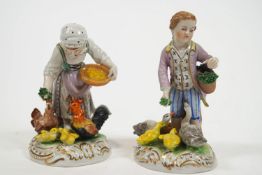 Two polychrome decorated Meissen style hard paste porcelain Dresden figures showing a lady and a