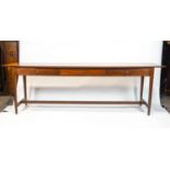 A 1970's Danish style teak and mahogany cross-banded sideboard, with three frieze drawers,