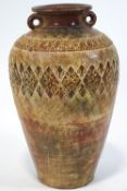 A large 20th century pottery floor vase, with two ring handles, possibly Mediterranean,