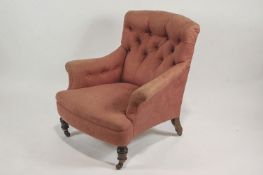 A 19th century armchair, possibly by Howard of London, numbered to rear leg,