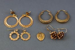 A collection of jewellery to include: Four pairs of earrings; A st Christopher pendant;