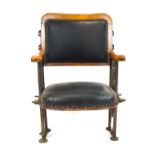An early 20th century oak framed cinema chair,