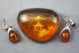 A pair of modern silver pendant drop earrings set amber,