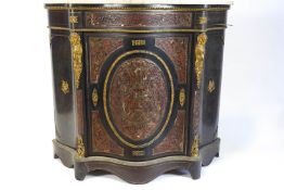 A 19th century boulle work credenza, of serpentine form, with marble top,