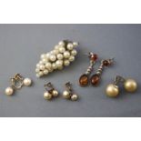 A collection of items to include: A stamped 9ct pair of cultured pearl screw clip earrings;