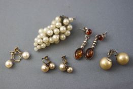 A collection of items to include: A stamped 9ct pair of cultured pearl screw clip earrings;