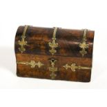 A late 19th century Continental walnut dome top trinket box with Gothic brass mounts,