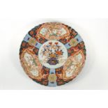 A large Japanese porcelain Imari charger,