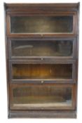 An oak Globe Wernick style four tier bookcase,