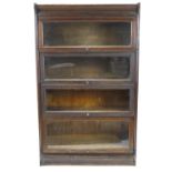 An oak Globe Wernick style four tier bookcase,