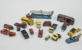 A quantity of Dinky, Corgi and other play worn lorries and other vehicles,